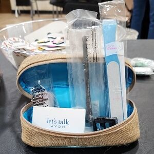 AVON BEAUTY ESSENTIALS KIT with BLUE and TAN CASE